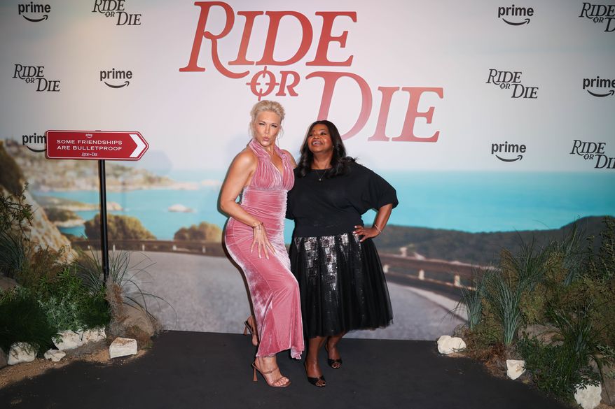 Hannah Waddingham, left, and Octavia Spencer pose for photographers upon arrival at the premiere of the series 'Ride or Die' on Monday, June 22, 2026, in London. (Photo by Millie Turner/Invision/AP)