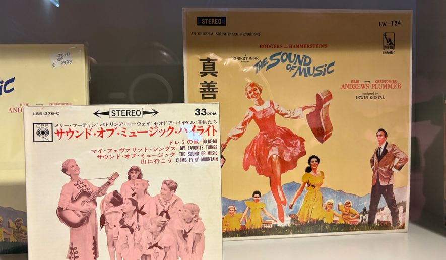 In this photo taken with a smartphone, records with the film score of the musical film "The Sound of Music" are displayed in the exhibition of the new "Sound Of Music Salzburg" museum in Salzburg, Austria, Sunday, Sept. 20, 2026. (AP Photo/Philipp-Moritz Jenne)