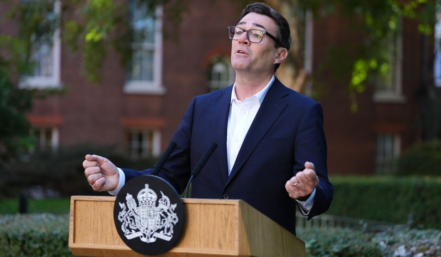 Britain's Prime Minister Andy Burnham gives a speech during a reception at 10 Downing Street, London, Monday Sept. 21, 2026, to recognise the contribution of organisations and volunteers who supported communities across the UK this summer, through the recent heatwaves, wildfires and other emergencies. (Jonathan Brady/Pool Photo via AP)