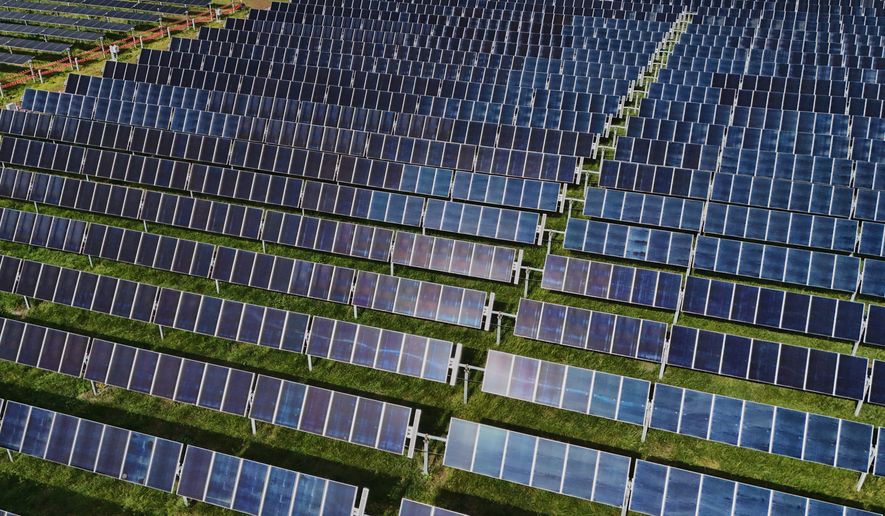 FILE - Solar panels operate April 28, 2026, at a farm in Christiana, Tenn. (AP Photo/Joshua A. Bickel, File)