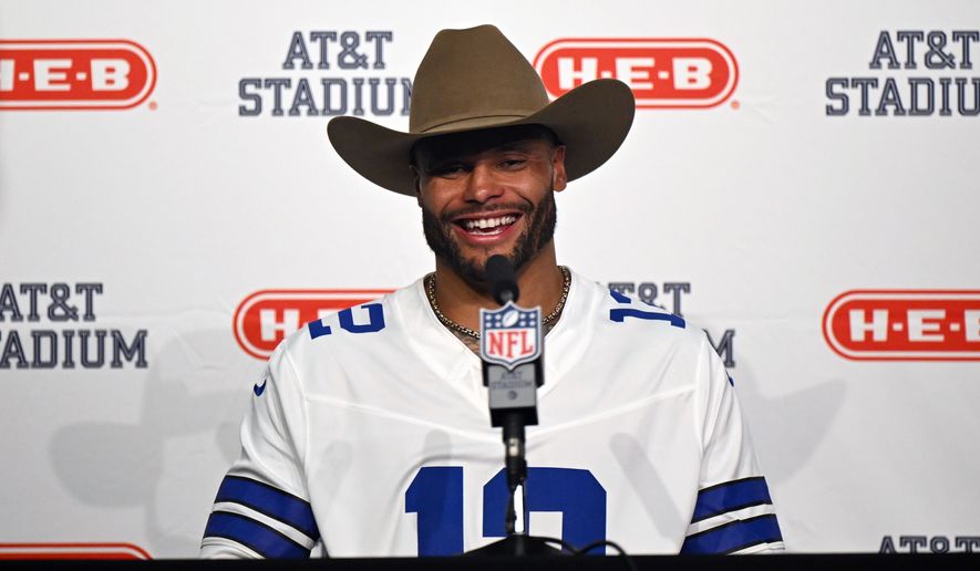 Dallas Cowboys quarterback Dak Prescott speaks in a press conference after an NFL football game against the Washington Commanders in Arlington, Texas, Sunday, Sept. 20, 2026. (AP Photo/Jessica Tobias)