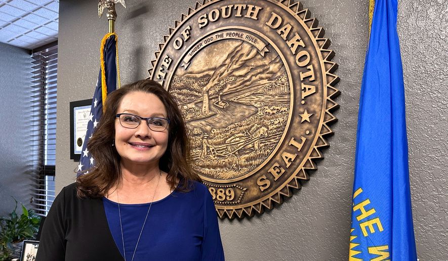 FILE - South Dakota Republican Secretary of State Monae Johnson is pictured in her office on Jan. 11, 2024, in Pierre, S.D. (AP Photo/Jack Dura, File)