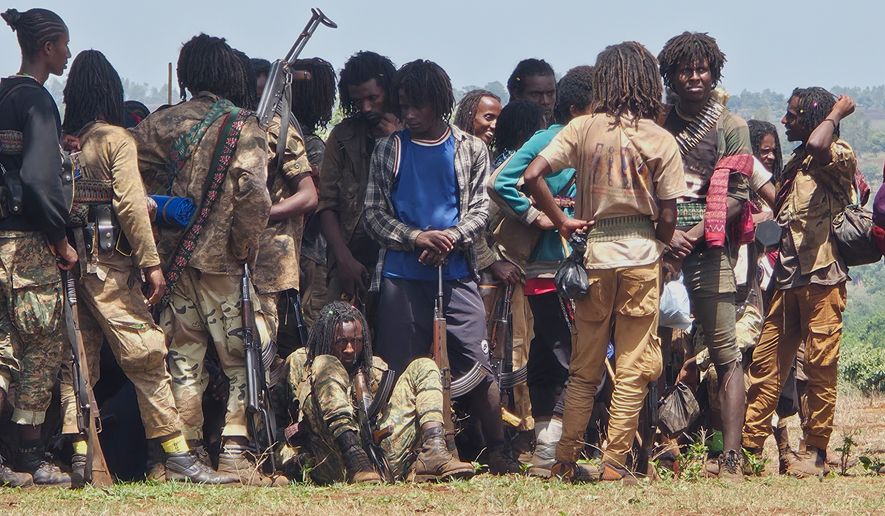 FILE - Oromo Liberation Army (OLA) fighters attend an orientation session in western Oromia, Ethiopia, June 2, 2025. (AP Photo, File)