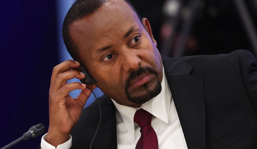 FILE - Ethiopian Prime Minister Abiy Ahmed Ali attends a session at the World Atomic Week forum at the Exhibition of Achievements of National Economy (VDNKh) in Moscow, Russia, Thursday, Sept. 25, 2025. (Sergei Bulkin, Sputnik, Kremlin Pool Photo via AP, File)
