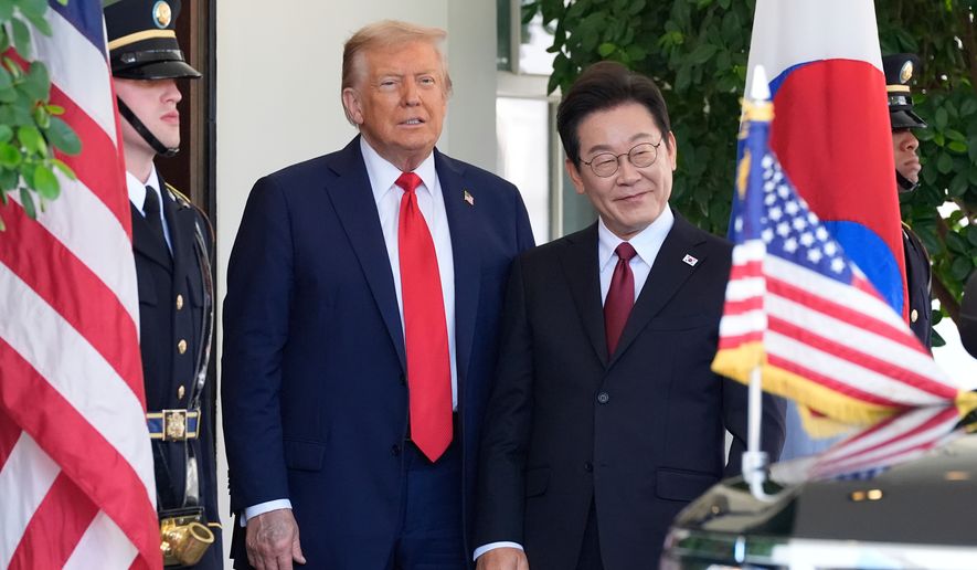 President Donald Trump, left, greets South Korean President Lee Jae Myung upon his arrival at the White House, on Aug. 25, 2025, in Washington. (AP Photo/Alex Brandon, File)