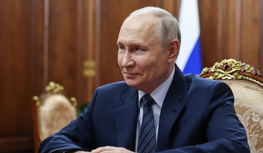 Russian President Vladimir Putin meets with Russian Federal Customs Service Valery Pikalev in Moscow, Monday, Sept. 21, 2026. (Vyacheslav Prokofyev, Sputnik, Kremlin Pool Photo via AP)