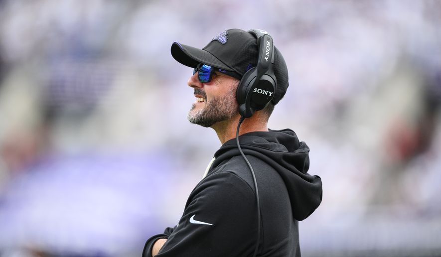 Baltimore Ravens head coach Jesse Minter watches from the sideline in the second half of an NFL football game against the New Orleans Saints in Baltimore, Sunday, Sept. 20, 2026. (AP Photo/Nick Wass)