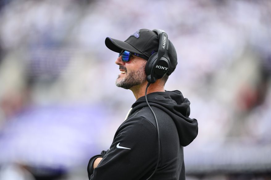 Baltimore Ravens head coach Jesse Minter watches from the sideline in the second half of an NFL football game against the New Orleans Saints in Baltimore, Sunday, Sept. 20, 2026. (AP Photo/Nick Wass)