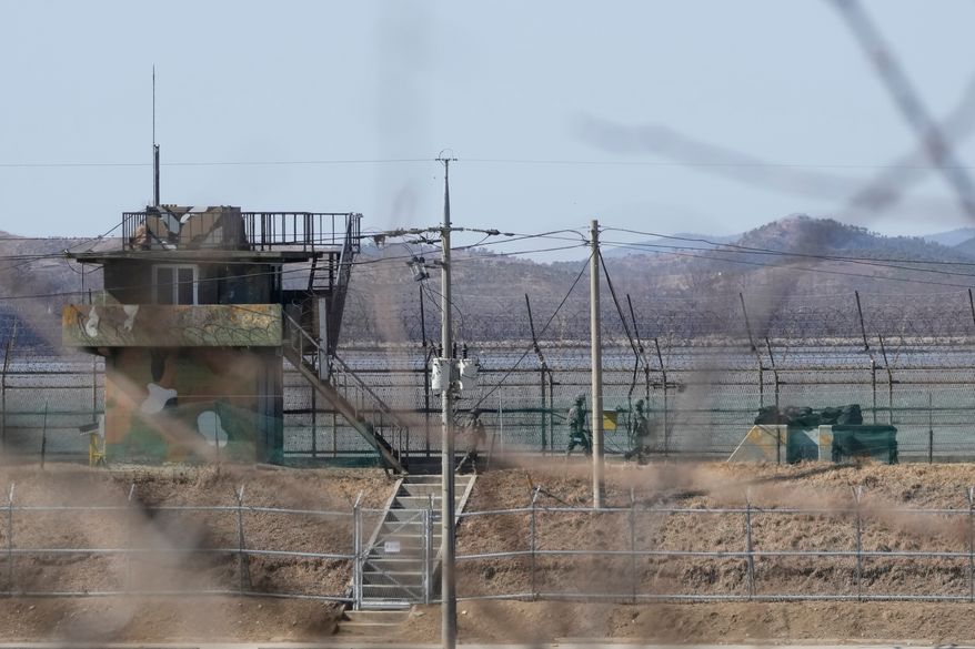 South Korean army soldiers patrol along the barbed-wire fence in Paju, South Korea, near the border with North Korea, on Feb. 18, 2025. (AP Photo/Ahn Young-joon) **FILE**