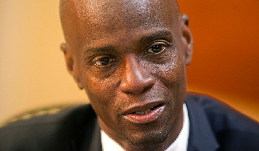 FILE - Haiti's President Jovenel Moise speaks during an interview at his home in Petion-Ville, a suburb of Port-au-Prince, Haiti, on Feb. 7, 2020. (AP Photo/Dieu Nalio Chery, File)