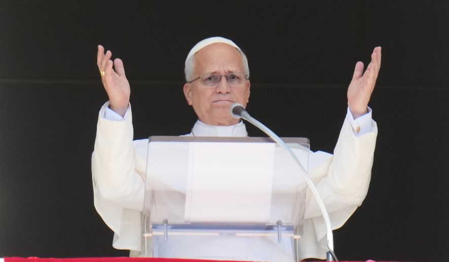 Pope Leo XIV delivers the Angelus noon prayer in St. Peter' s Square, at the Vatican, Sunday, Sept. 20, 2026. (AP Photo/Gregorio Borgia)