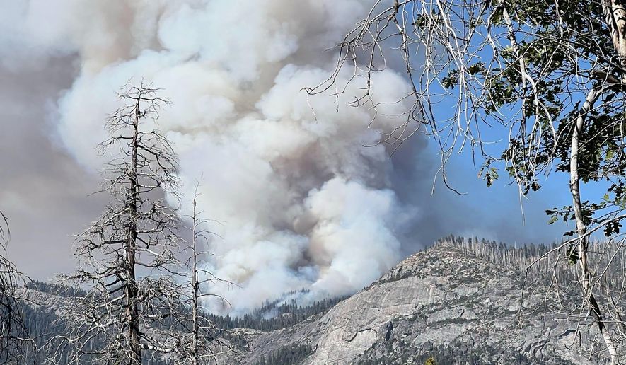 This photo provided by the National Parks Service shows the Dome Fire burning in Yosemite National Park on Tuesday, Sept. 15, 2026. (National Parks Service via AP)
