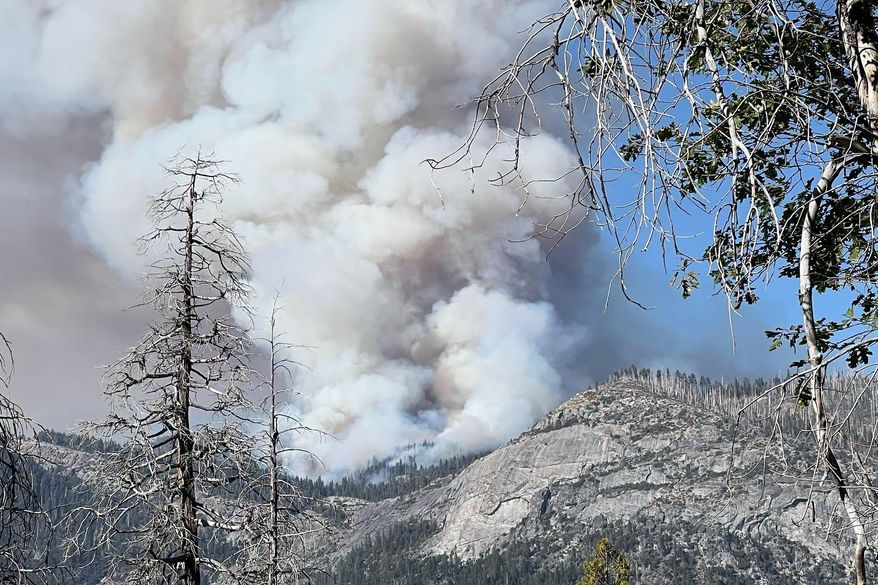 This photo provided by the National Parks Service shows the Dome Fire burning in Yosemite National Park on Tuesday, Sept. 15, 2026. (National Parks Service via AP)