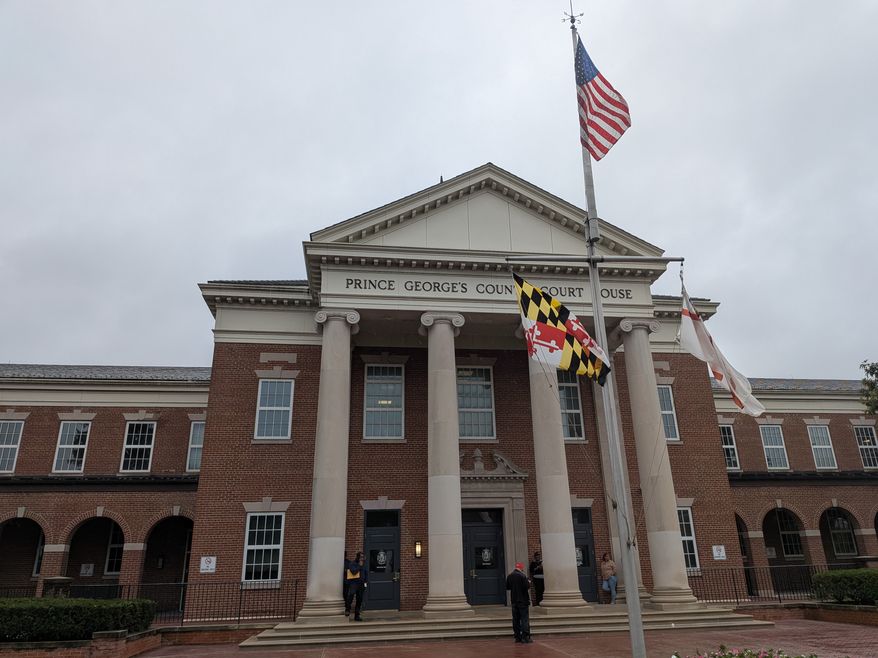 A Maryland circuit court judge granted a continuance to Marylander Condominiums residents in a receivership hearing on Tyesday, Sept. 22, at the Prince George's County Court House. The Adelphi condos, adjoining a homeless encampment, have been without heat since November 2025. (Sean Salai/The Washington Times)