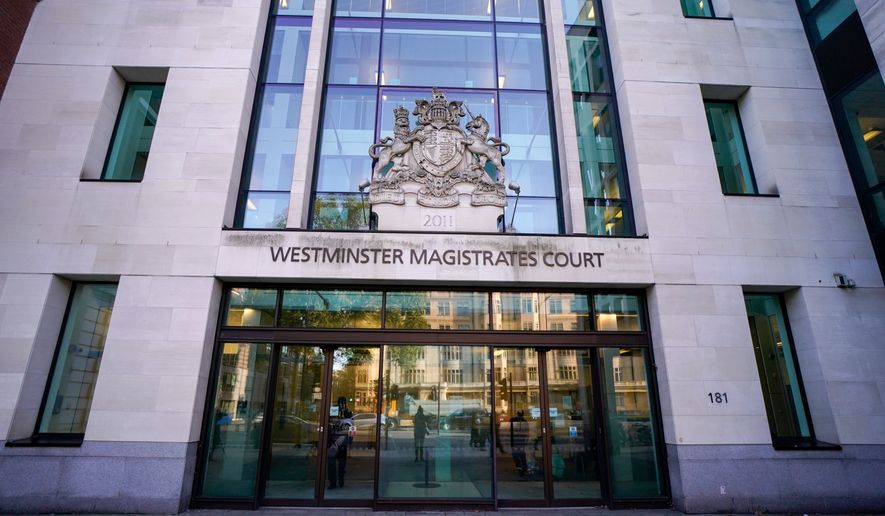 FILE - The outside of Westminster Magistrates Court in London, Oct. 21, 2021. (AP Photo/Alberto Pezzali, File)