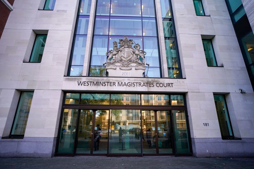 FILE - The outside of Westminster Magistrates Court in London, Oct. 21, 2021. (AP Photo/Alberto Pezzali, File)