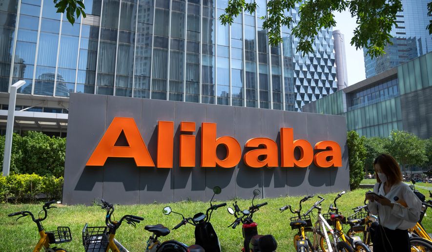 The logo of Chinese technology firm Alibaba is seen at its office in Beijing, Aug. 10, 2021. (AP Photo/Mark Schiefelbein, File)
