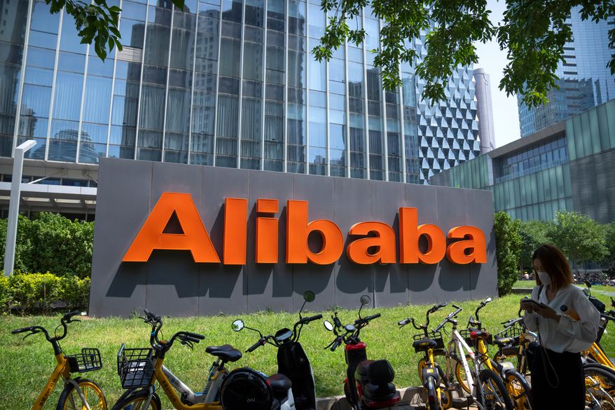The logo of Chinese technology firm Alibaba is seen at its office in Beijing, Aug. 10, 2021. (AP Photo/Mark Schiefelbein, File)