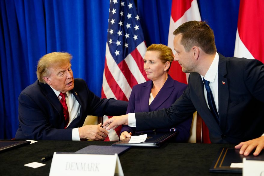 Denmark's Prime Minister Mette Frederiksen, center, Greenland's Prime Minister Jens-Frederik Nielsen, right, and U.S. President Donald Trump at the signing ceremony of a security deal among the U.S., Denmark and Greenland at United Nations headquarters, Tuesday, Sept. 22, 2026. (Mads Claus Rasmussen/Ritzau Scanpix via AP)
