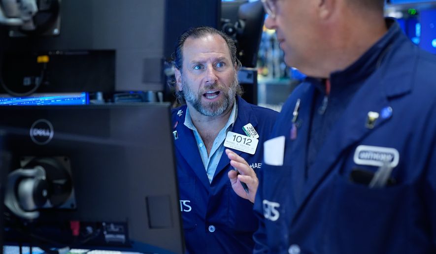 Michael Pistillo works on the floor at the New York Stock Exchange in New York, Monday, Sept. 14, 2026. (AP Photo/Seth Wenig)