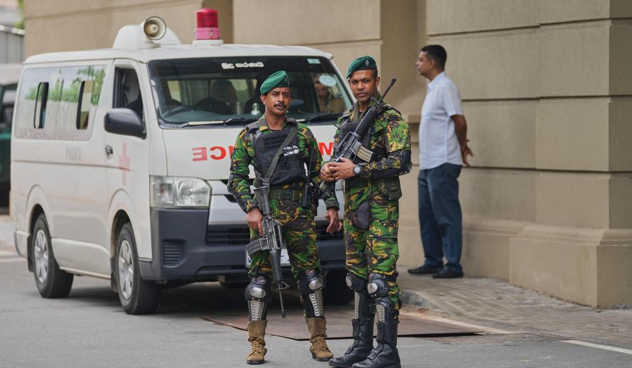 Police commandos stand guard at the High Court complex ahead of a verdict related to the 2019 Easter bombings in Colombo, Sri Lanka, Tuesday, Sept. 22, 2026.(Eranga Jayawardane)