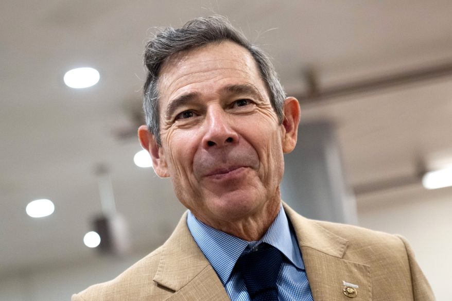 Sen. John Curtis, R-Utah, walks through the Capitol during votes in Washington, July 16, 2026. (AP Photo/Allison Robbert, File)