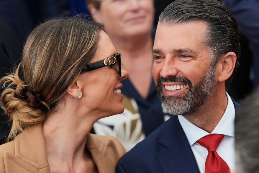 Donald Trump Jr. speaks with his wife, Bettina, left, as they wait for President Donald Trump to deliver remarks to U.S. Embassy staff at Deerfield Residence in Dublin, Sept. 12, 2026. (AP Photo/Julia Demaree Nikhinson, File)