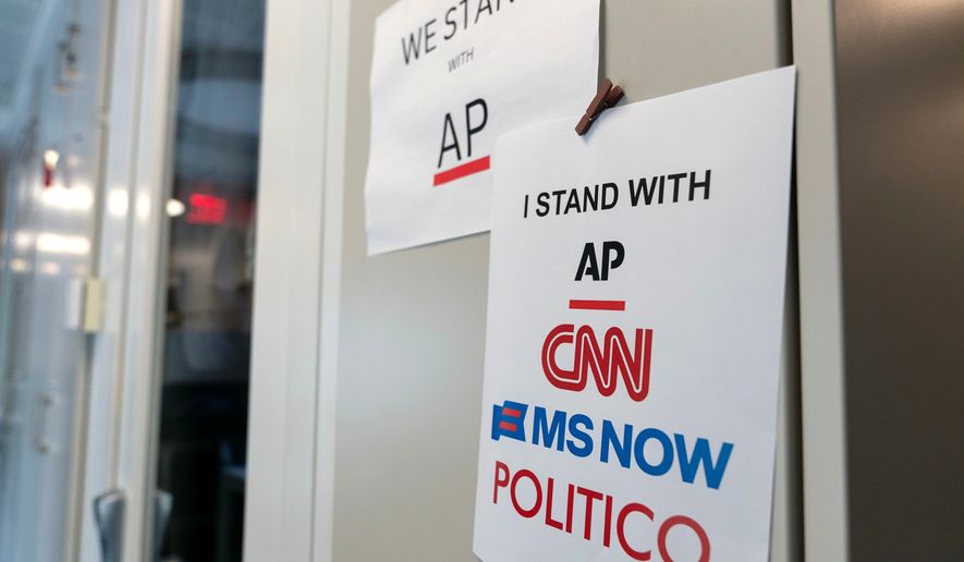 A sign in support of news outlets is seen at the White House press room, Sept. 19, 2026, in Washington. (AP Photo/Jose Luis Magana)