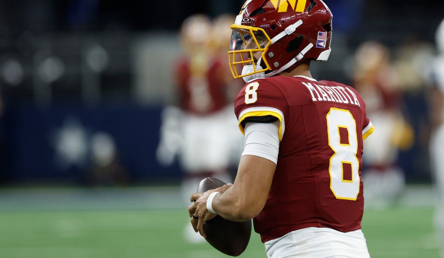 Washington Commanders quarterback Marcus Mariota (8) during pregame warmups before an NFL football game against the Dallas Cowboys in Arlington, Texas, Sunday, Sept. 20, 2026. (AP Photo/Matt Patterson)