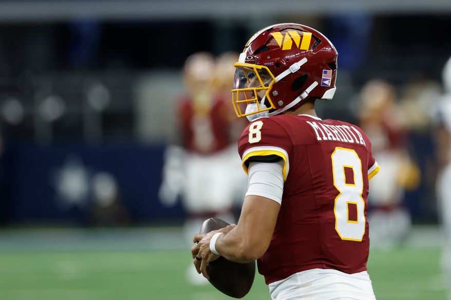 Washington Commanders quarterback Marcus Mariota (8) during pregame warmups before an NFL football game against the Dallas Cowboys in Arlington, Texas, Sunday, Sept. 20, 2026. (AP Photo/Matt Patterson)