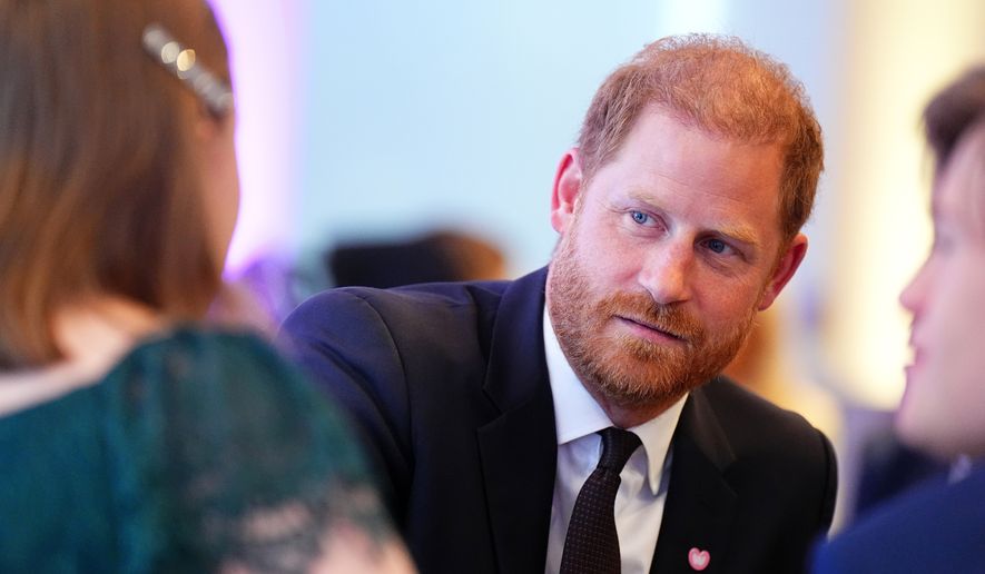 Britain's Prince Harry meets the winner of the Inspirational Young Person 15-18, Rosanna Cornforth-Revill, during the WellChild Awards 2026 in London, Monday, Sept. 21, 2026. (Aaron Chown/Pool Photo via AP)