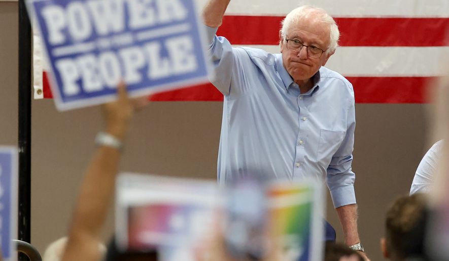 Sen. Bernie Sanders, I-Vt., walks onto the stage during a Get Out the Vote campaign event supporting Massachusetts Sen. Ed Markey in Boston, Saturday, Aug. 29, 2026. (AP Photo/Mark Stockwell)