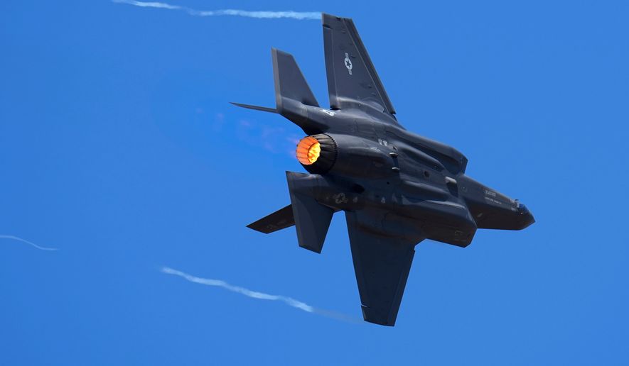 FILE - U.S. Air Force fighter aircraft F-35 performs aerobatic maneuvers on the second day of the Aero India 2023 at Yelahanka air base in Bengaluru, India, Feb. 14, 2023. (AP Photo/Aijaz Rahi, File)