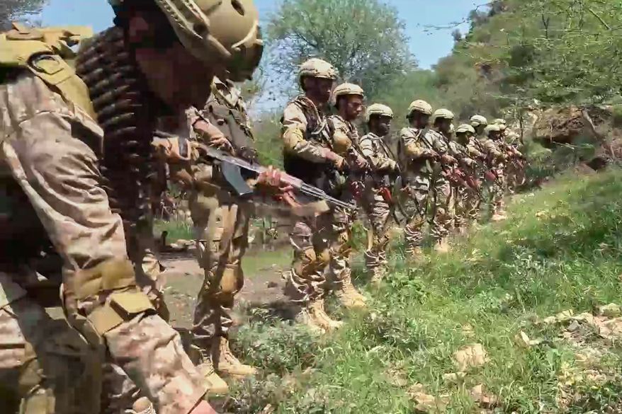 This image taken from undated video released by the Ansar Allah Media Office, the media arm of Yemen's Houthi rebels, on Tuesday, Sept. 22, 2026, shows what the group says are Houthi fighters standing in formation in an area of clashes with Saudi-backed forces in Yemen. (Ansar Allah Media Office via AP)