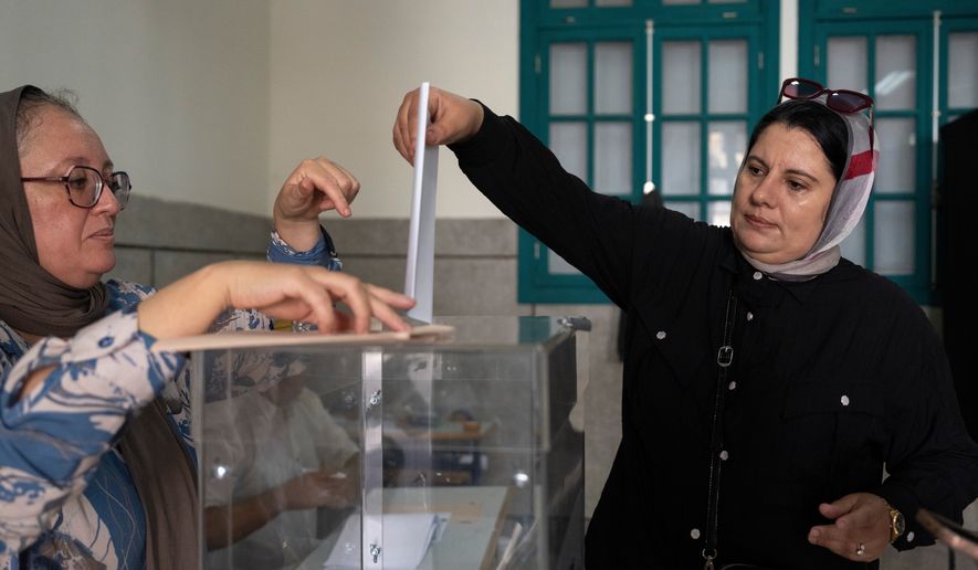 A woman casts her vote inside a polling station during the legislative elections in Rabat, Morocco, Wednesday, Sept. 23, 2026. (AP Photo/Mosa'ab Elshamy)