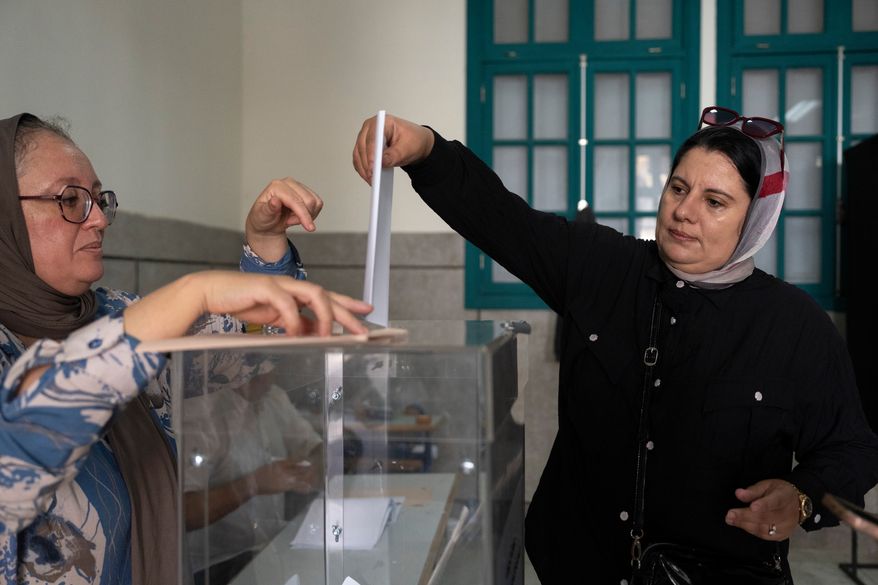 A woman casts her vote inside a polling station during the legislative elections in Rabat, Morocco, Wednesday, Sept. 23, 2026. (AP Photo/Mosa'ab Elshamy)