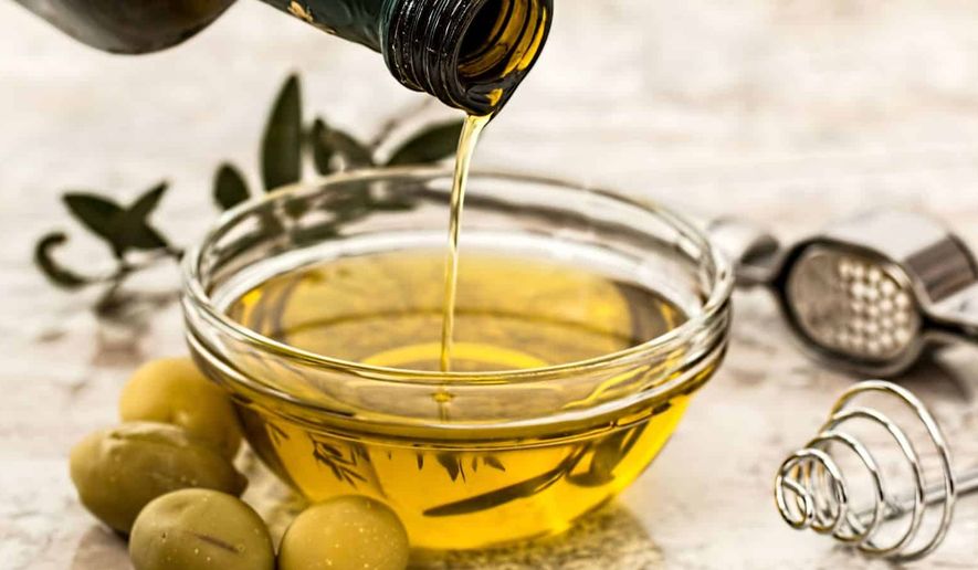 National Extra Virgin Olive Oil Day celebrates the staple's many roles in the kitchen, proving it's more than a salad dressing. Photo credit: Pexels.