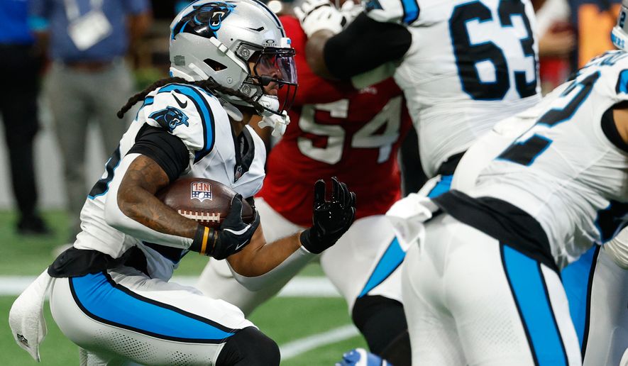 Carolina Panthers running back Jonathon Brooks (25) rushes the ball during an NFL football game against the Atlanta Falcons in Atlanta, Sunday, Sept. 20, 2026. (AP Photo/Erik S. Lesser)