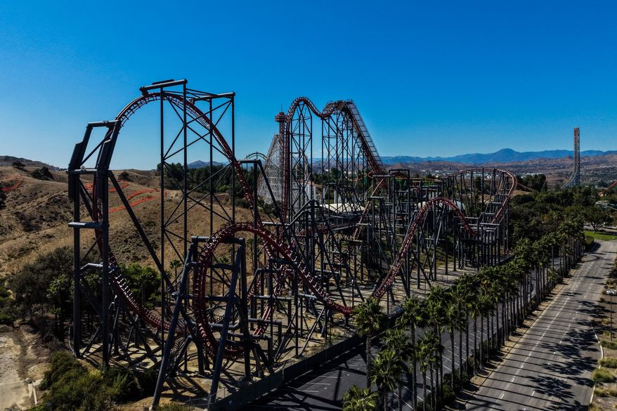 This aerial view shows the X2 roller coaster at Six Flags Magic Mountain in Valencia, Calif., Wednesday, Sept. 23, 2026. (AP Photo/Jae C. Hong)