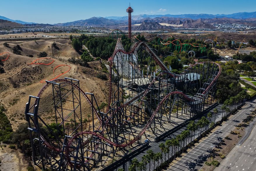 This aerial view shows the X2 roller coaster at Six Flags Magic Mountain in Valencia, Calif., Wednesday, Sept. 23, 2026. (AP Photo/Jae C. Hong)