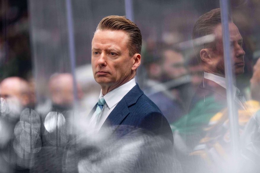 Dallas Stars head coach Glen Gulutzan watches from the bench during the third period of an NHL hockey game against the Boston Bruins, Jan. 20, 2026, in Dallas. (AP Photo/Jeffrey McWhorter, File)