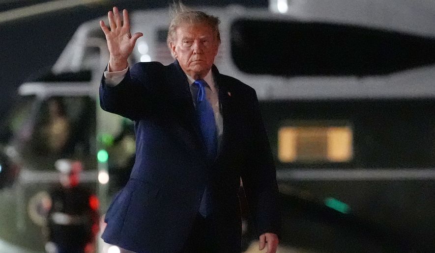 President Donald Trump walks from Marine One to board Air Force One at John F. Kennedy International Airport, Tuesday, Sept. 22, 2026, in New York. (AP Photo/Julia Demaree Nikhinson)