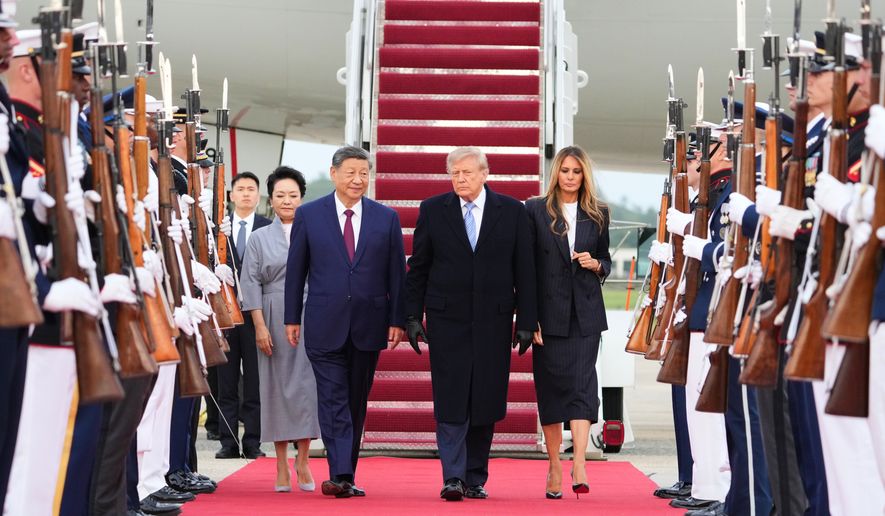 President Donald Trump and first lady Melania Trump walk with China's President Xi Jinping and his wife Peng Liyuan at Joint Base Andrews, Md., Wednesday, Sept. 23, 2026.(AP Photo/Alex Brandon)