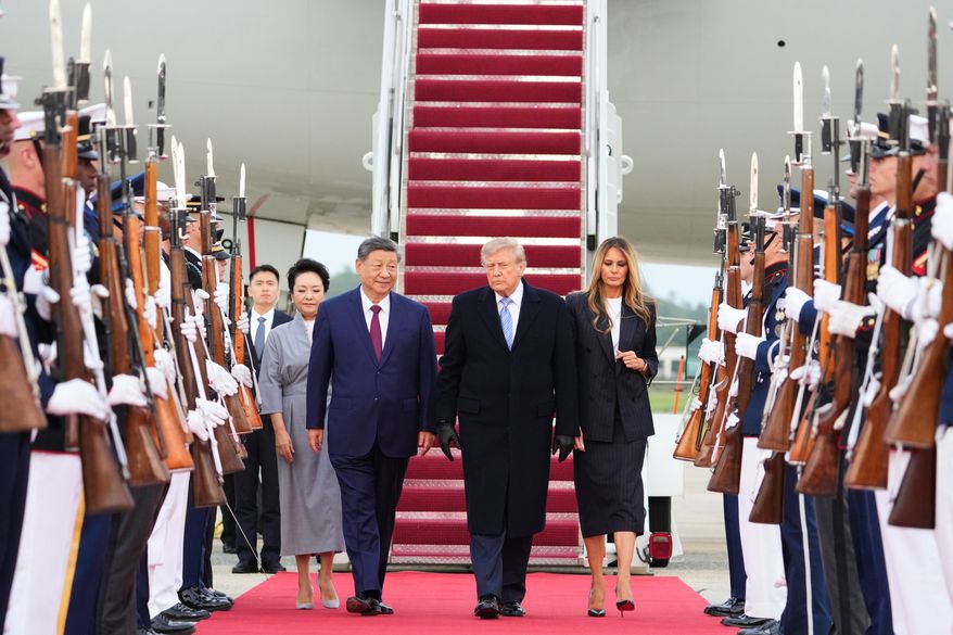 President Donald Trump and first lady Melania Trump walk with China's President Xi Jinping and his wife Peng Liyuan at Joint Base Andrews, Md., Wednesday, Sept. 23, 2026.(AP Photo/Alex Brandon)
