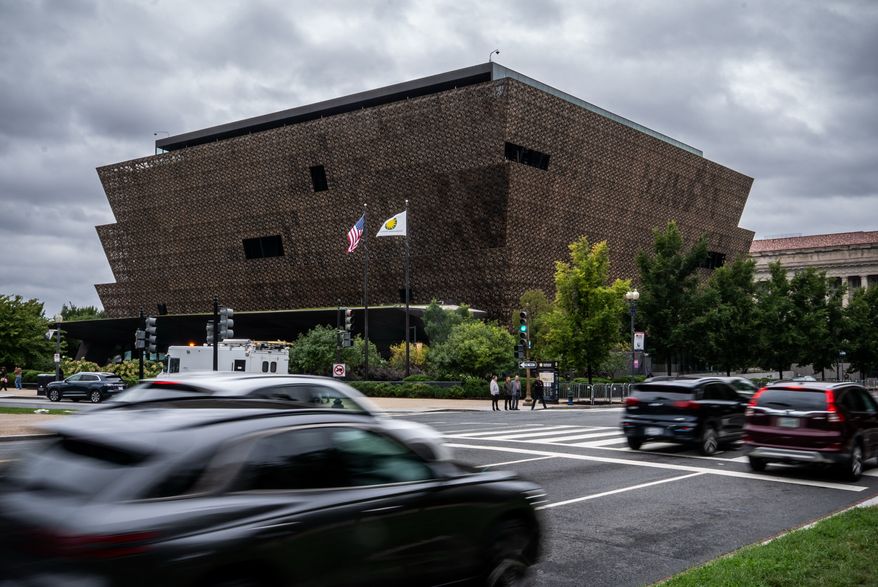 Cars drive past Smithsonian's National Museum of African American History and Culture, Wednesday, Sept. 23, 2026, in Washington. (AP Photo/Julia Demaree Nikhinson)