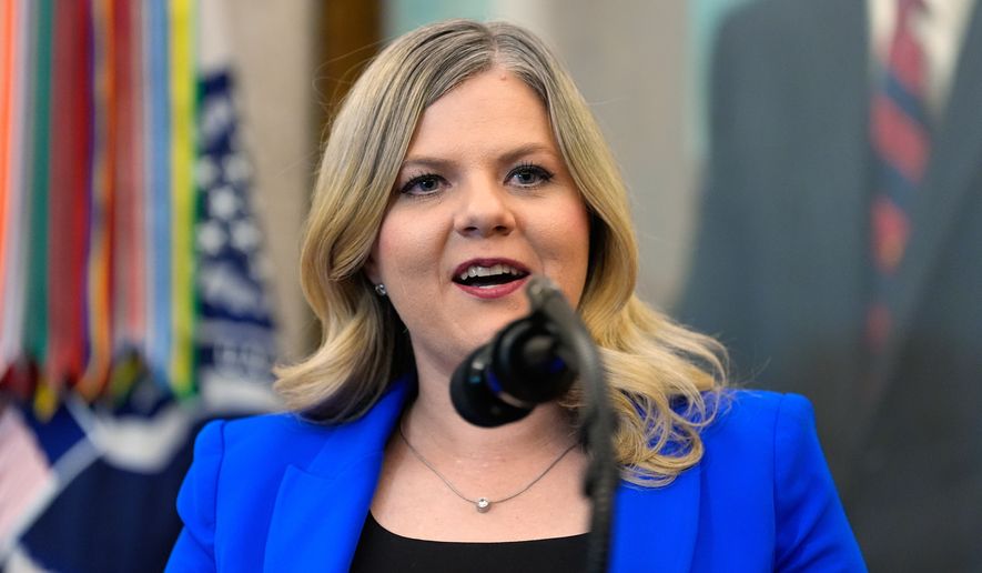 FILE - Dr. Heidi Overton, Deputy Director of the White House Domestic Policy Council, speaks about IVF during an event in the Oval Office of the White House with President Donald Trump, Oct. 16, 2025, in Washington. (AP Photo/Alex Brandon, File)