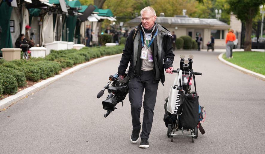 CNN Senior Photojournalist and contributing Producer Peter Morris, arrives on the White House grounds, Thursday, Sept. 24, 2026, in Washington. (AP Photo/Mark Schiefelbein)