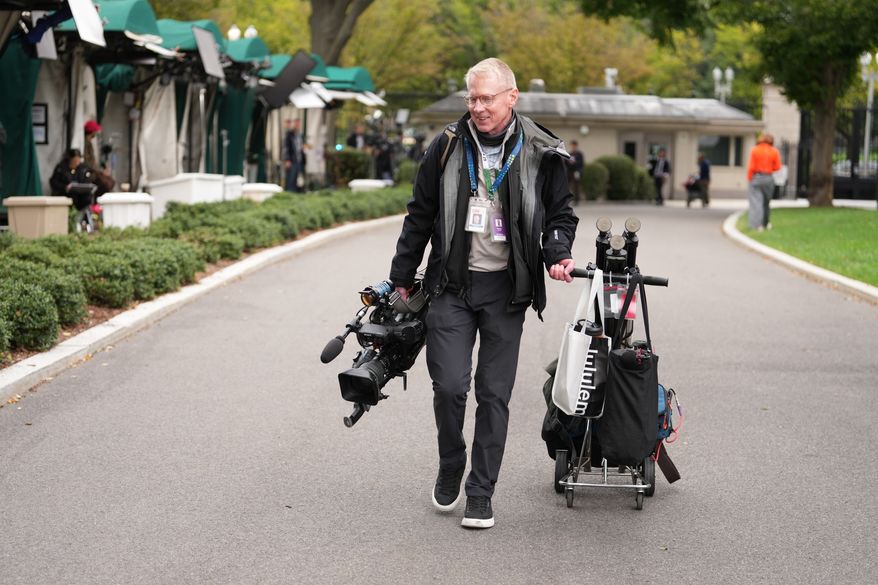 CNN Senior Photojournalist and contributing Producer Peter Morris, arrives on the White House grounds, Thursday, Sept. 24, 2026, in Washington. (AP Photo/Mark Schiefelbein)