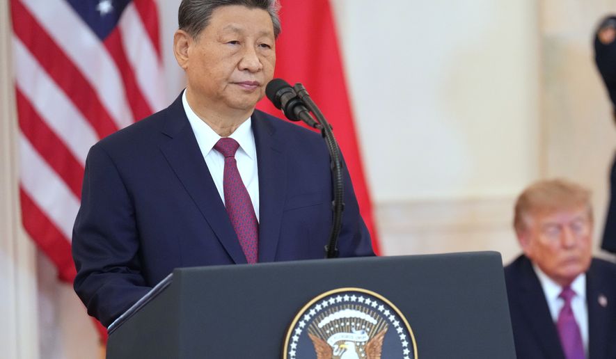 President Donald Trump listens as China's President Xi Jinping speaks during an arrival ceremony in the Grand Foyer of the White House, Thursday, Sept. 24, 2026, in Washington. (AP Photo/Jacquelyn Martin)
