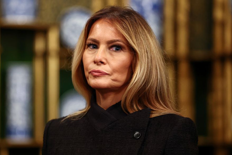 First lady Melania Trump arrives for a visit with first lady of China Peng Liyuan at the Smithsonian's National Museum of Asian Art, Thursday, Sept. 24, 2026, in Washington. (Finn Gomez/Pool Photo via AP) ** FILE **